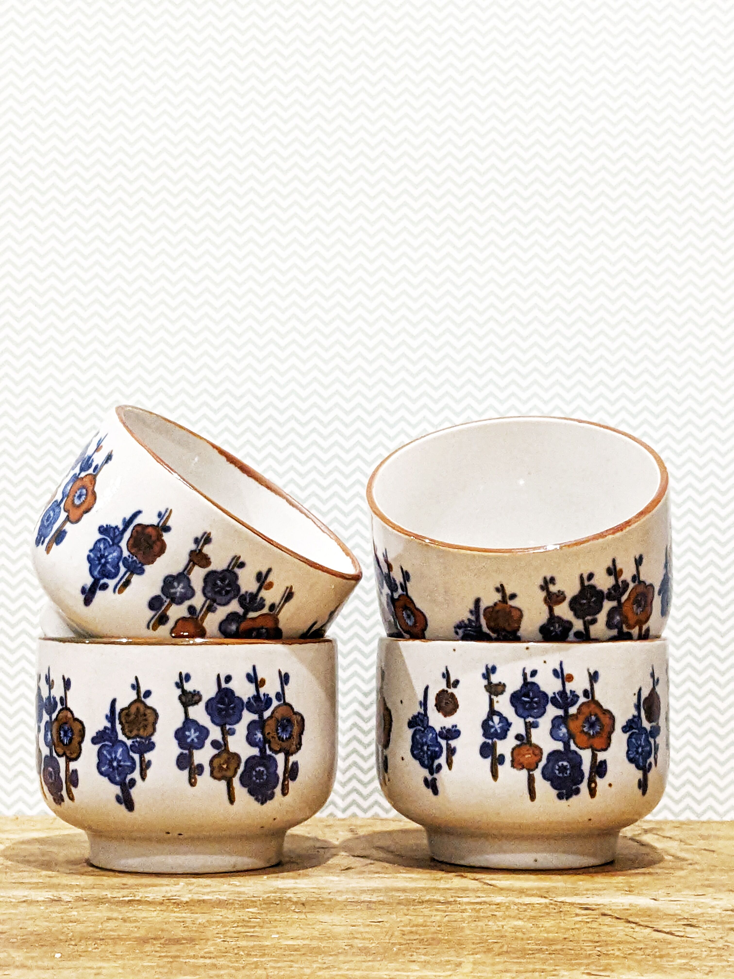 4 tea cups with delicate floral pattern