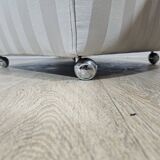 Winged armchair with footstool, 1960s.