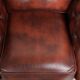 Vintage set of 2 cowhide leather Chesterfield armchairs in a brown colour