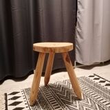Wooden tripod farm stool