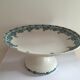 Ceramic cake dish on pedestal