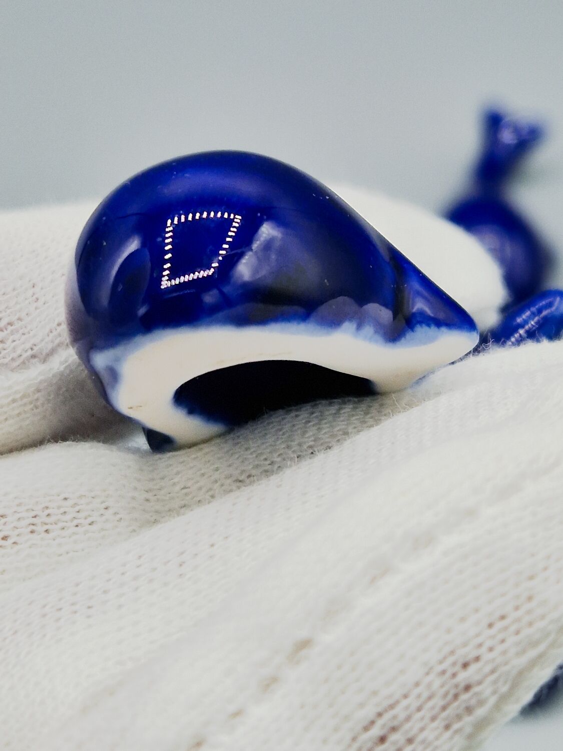 Set of 6 vintage blue porcelain whale knife rests.