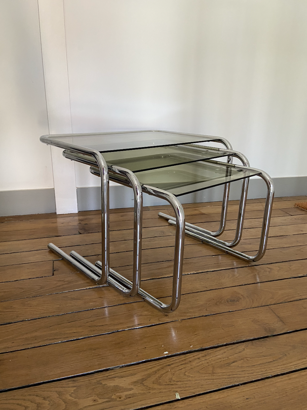 Vintage chrome trundle tables and smoked glasses 1970