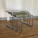 Vintage chrome trundle tables and smoked glasses 1970