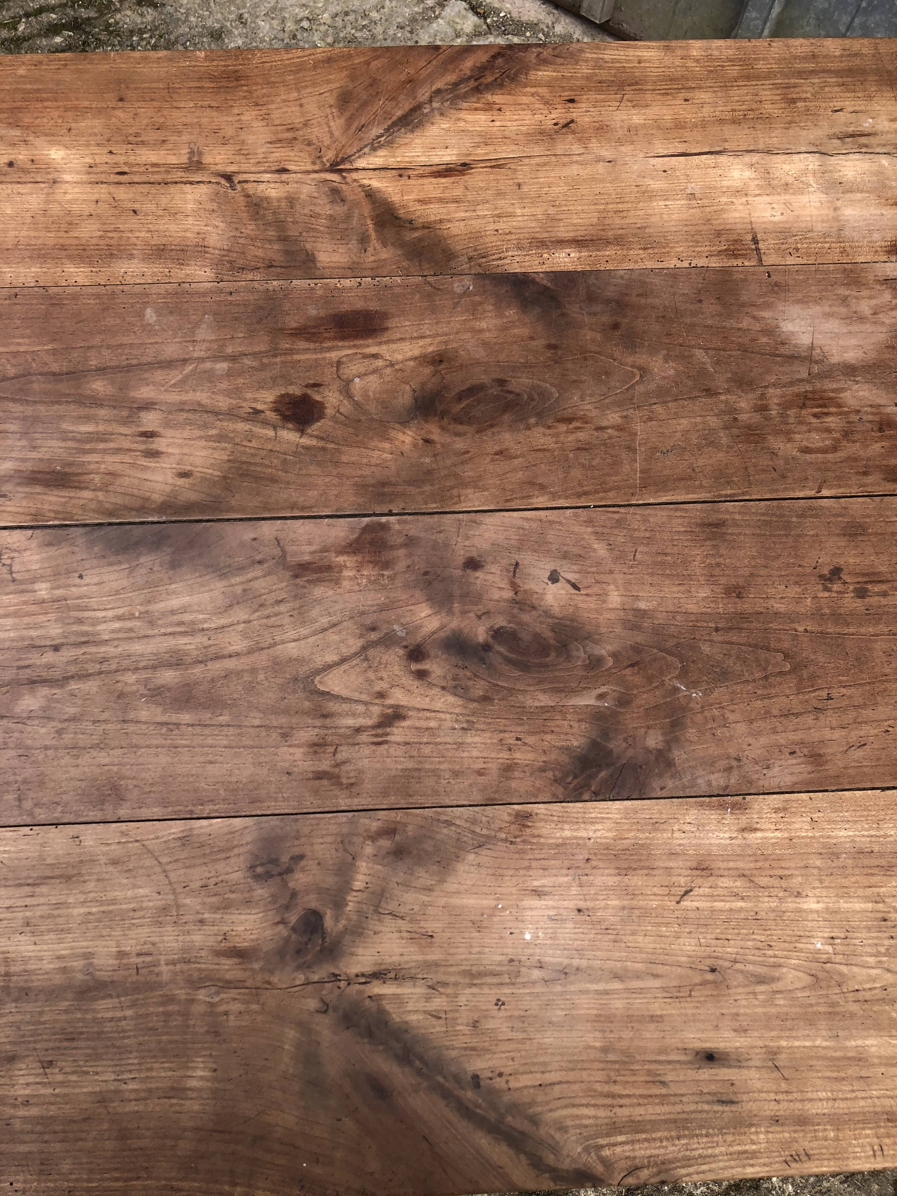 Antique cherry farmhouse table with 2 drawers and 1 pull-out