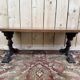 Table basse pieds fonte et plateau bois parquet