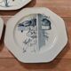 Set of three blue ironstone flat plates.