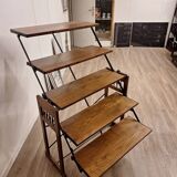 Old tilting shelf transformable into a table