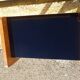 Oak bedside table with tapered legs