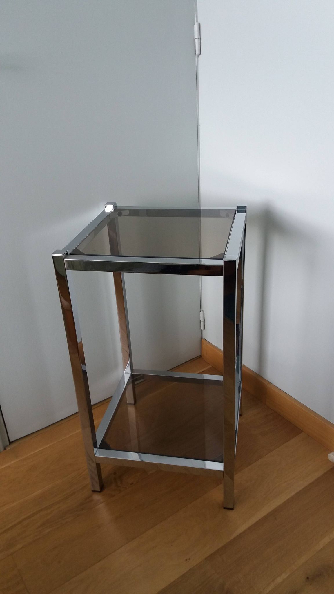 Chrome metal and smoked glass console