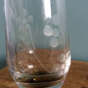Cut glass soliflore vase with a smoked glass base.