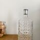 Bouteille en verre taillé vintage