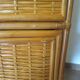 Storage column, wooden bookshelf and woven rattan.