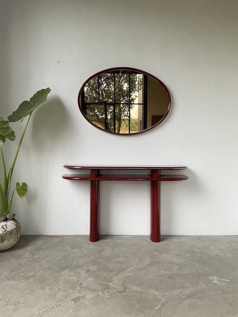 Red lacquered console and its mirror from the 80s