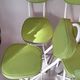 Set of 4 folding cocktail chairs in olive green faux leather from the 1970s.