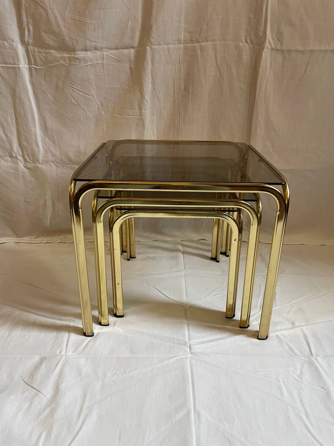 Brass and smoked glass nesting tables