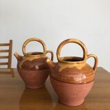 Pair of vintage terracotta watering cans