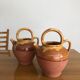 Paire d’arrosoirs vintage terre cuite