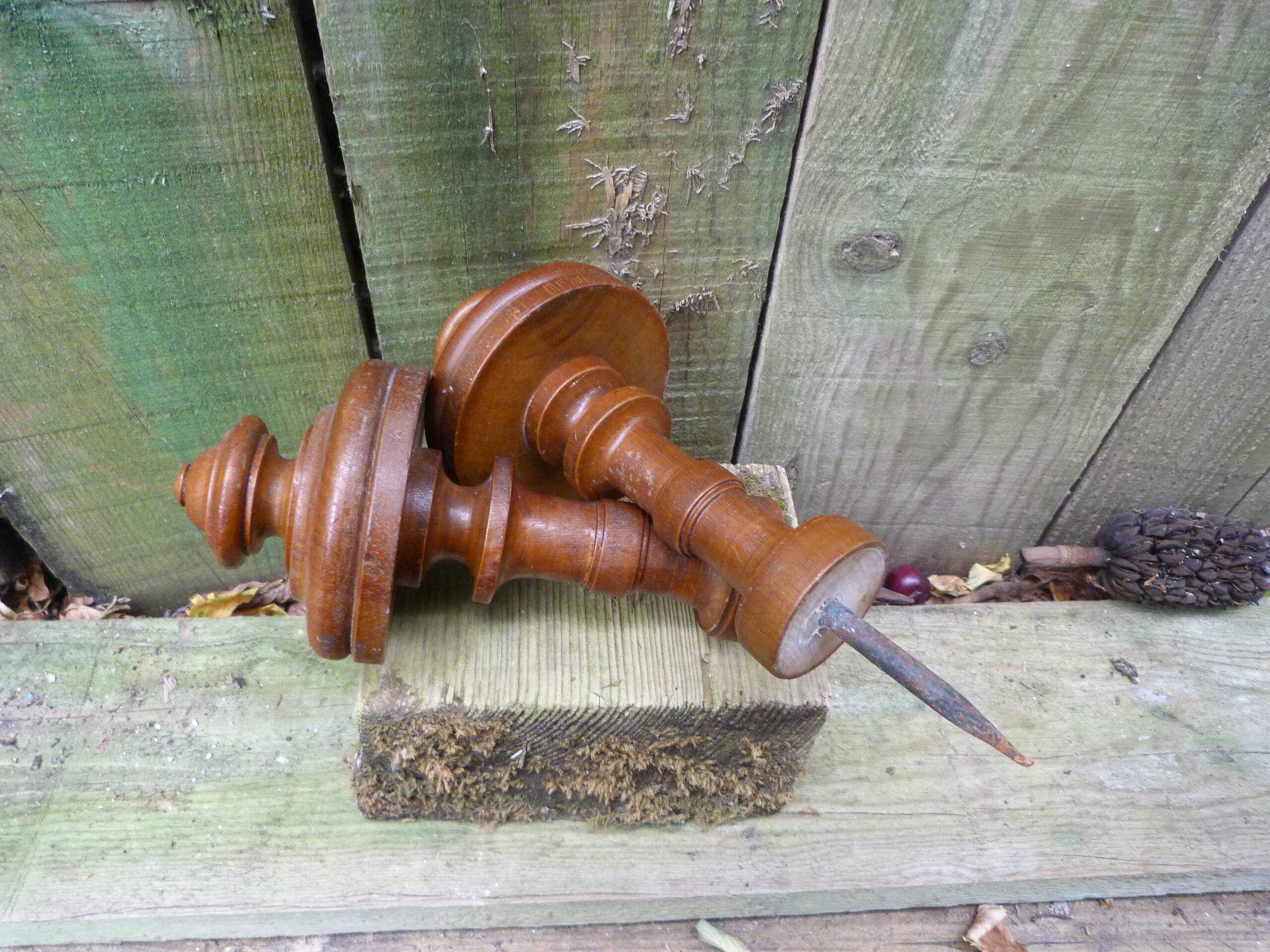 Pair of old turned wood pieces for curtain tieback finishes
