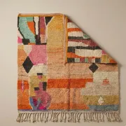 Moroccan handwoven wool rug in colour block peach, pink, teal, and orange, 122x183 cm.