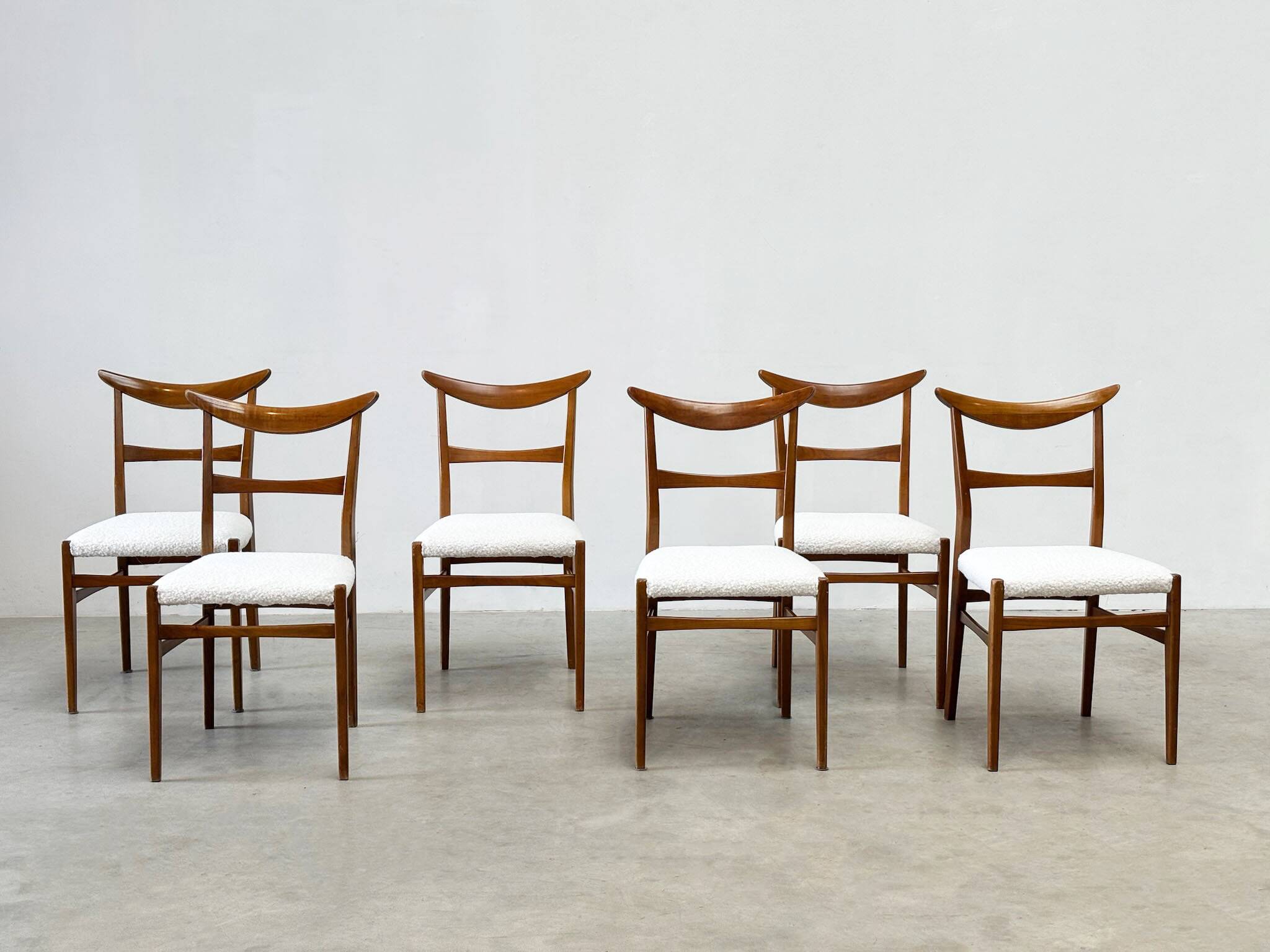 Set of six walnut Lübke dining chairs