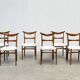 Set of six walnut Lübke dining chairs