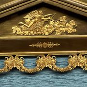 Empire-style fireplace decoration.