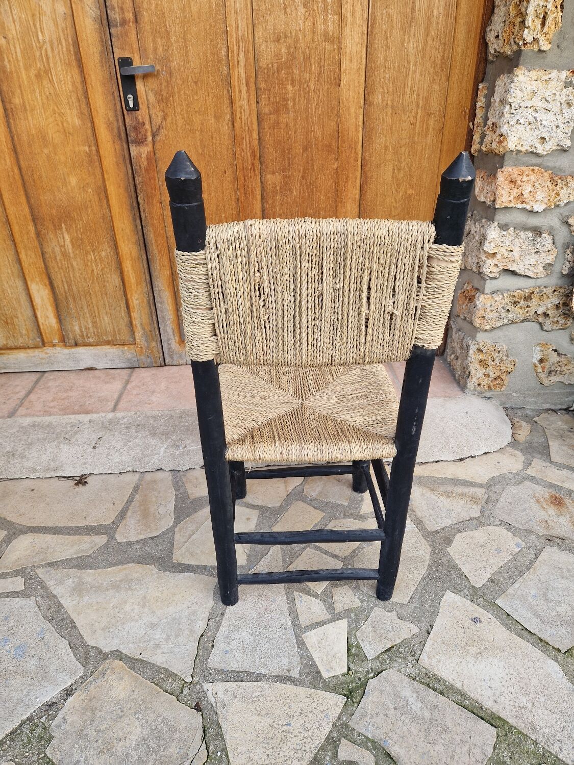 Brutalist straw-filled peasant chair