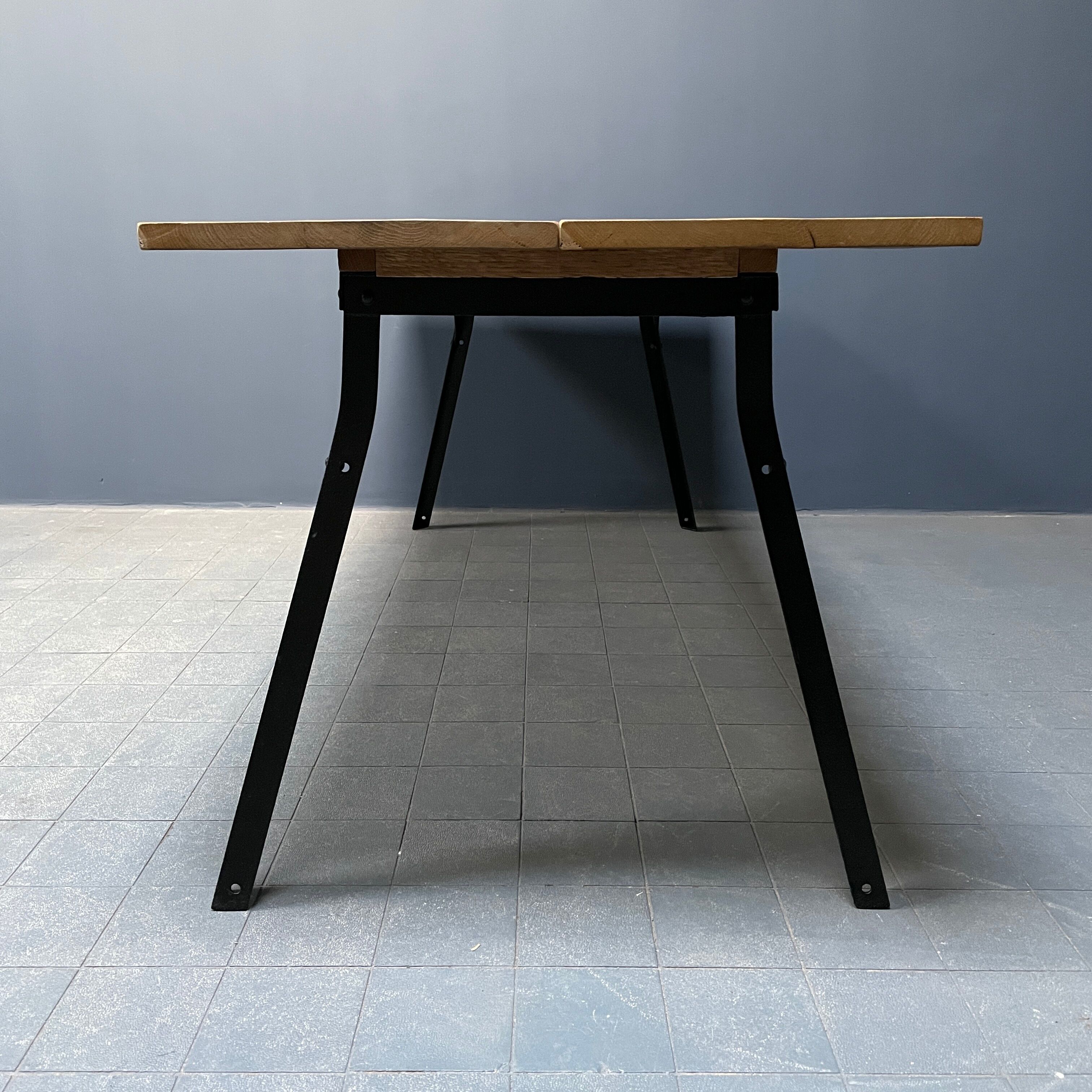 Handmade industrial oak dining table with black metal legs