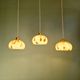 Trio of Art Deco pendant lights in marbled opaline glass, 1920s-30s