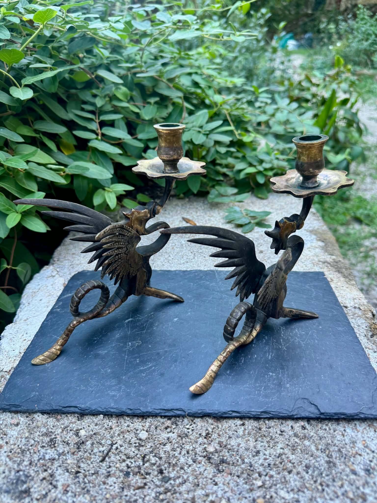 Pair of chimera candle holders in bronze, 19th century.