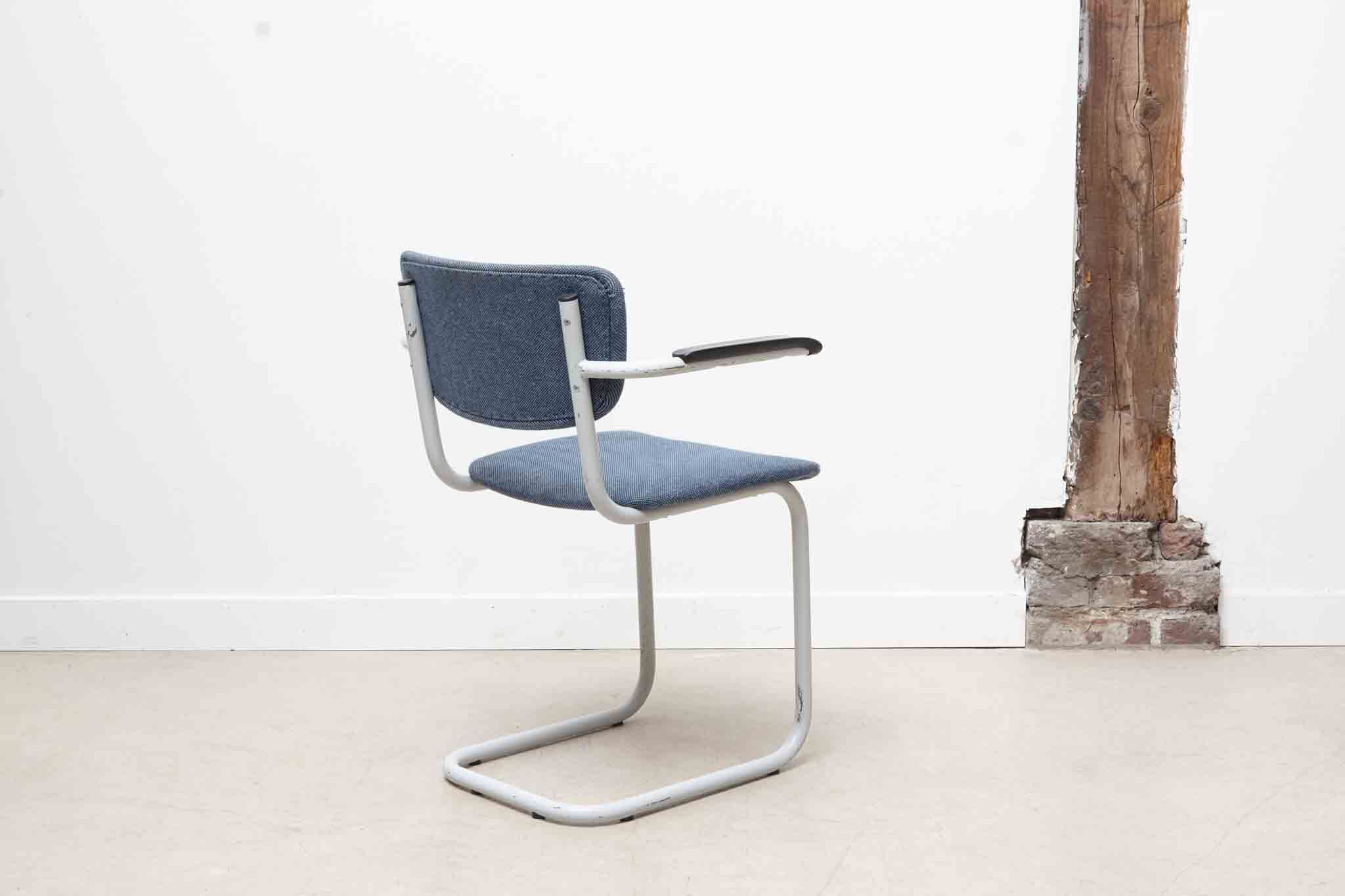 Blue fabric S-shaped chair with armrests