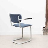 Blue fabric S-shaped chair with armrests