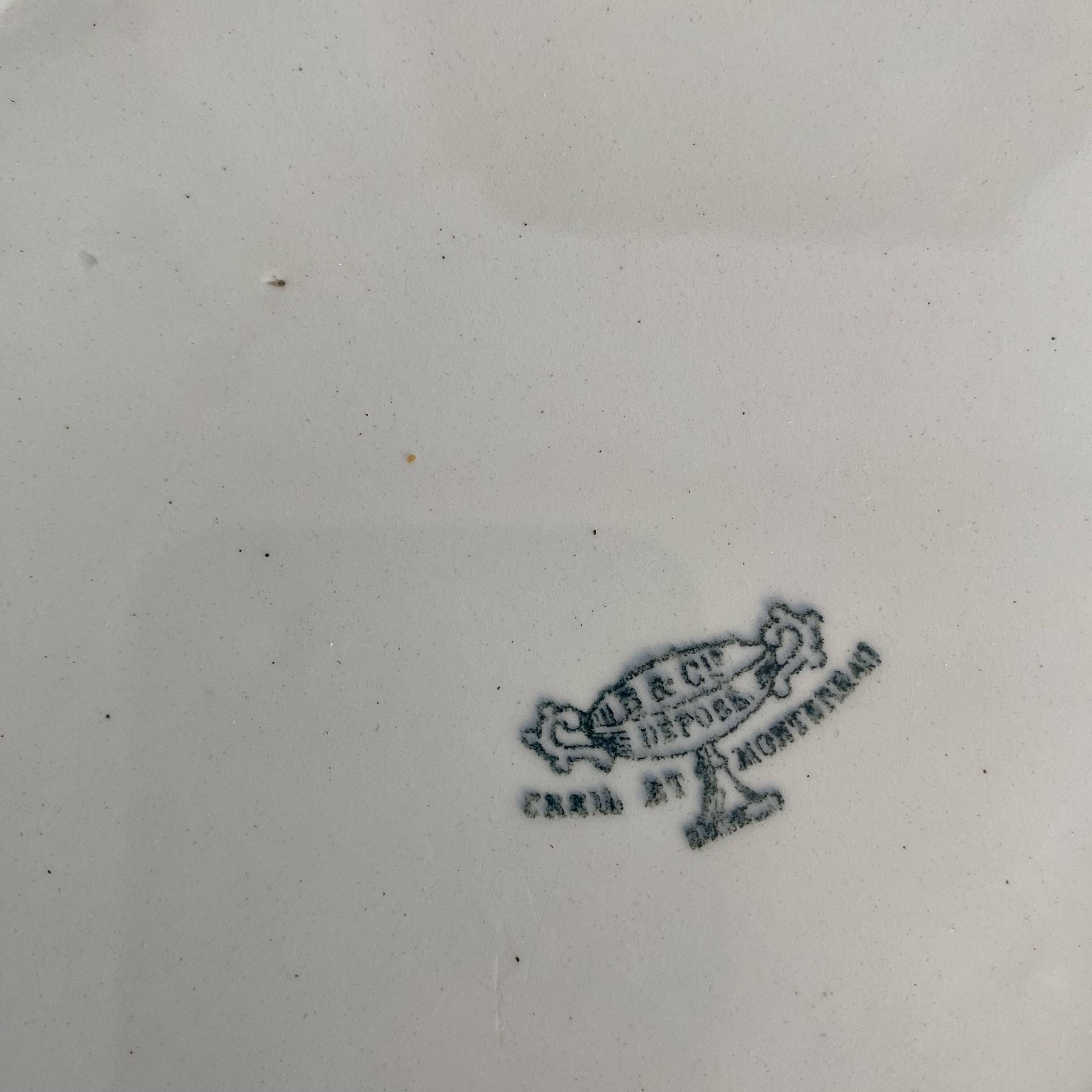 Set of large round white earthenware dishes from Creil and Montereau, 19th century