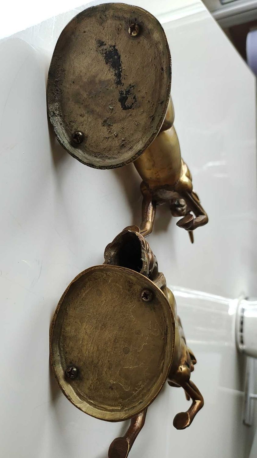 of greenhouse art deco bookends recancing unicorns. solid brass