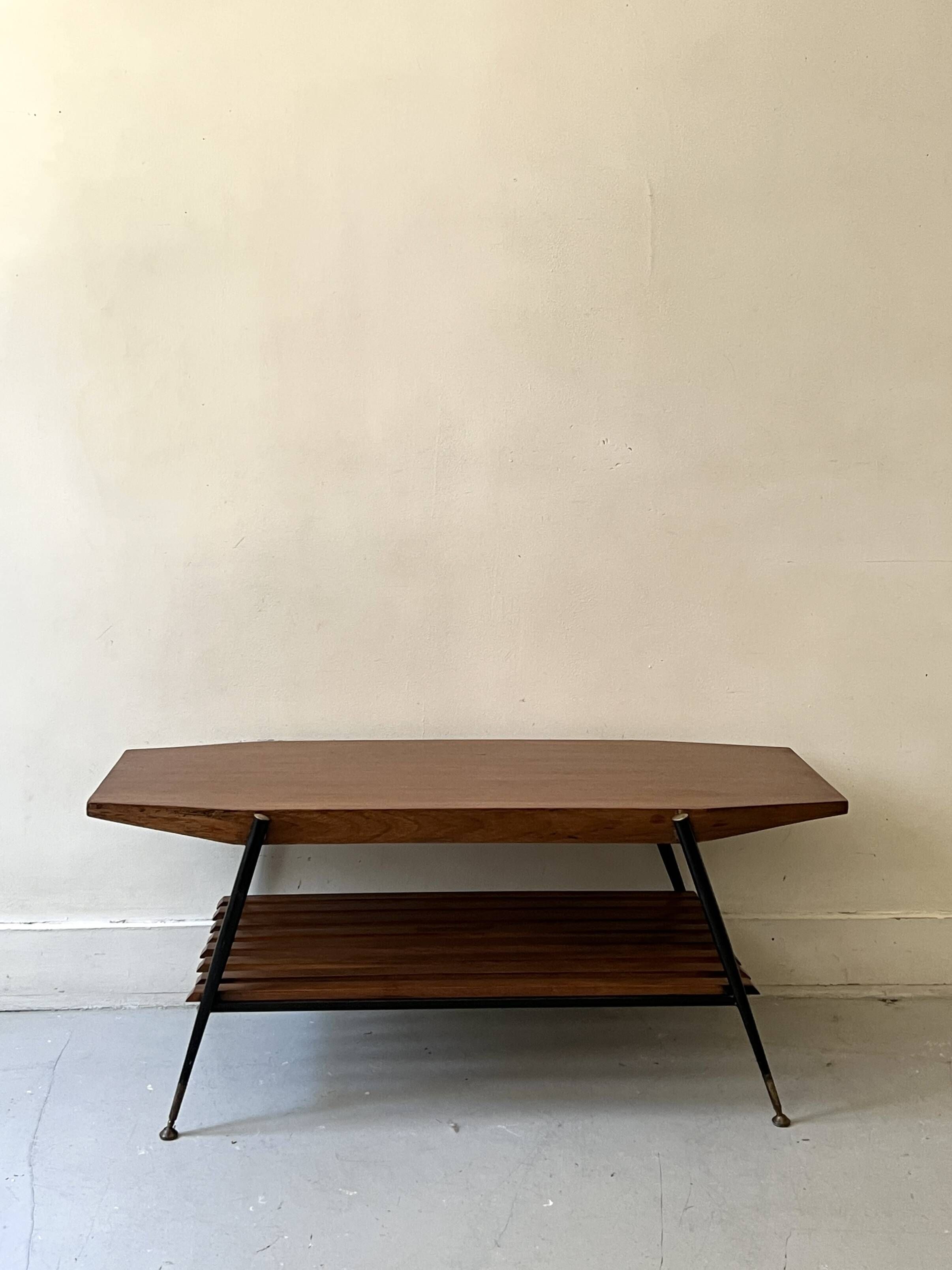 Mid-century coffee table with 2 mahogany wood tops and brass detail, Italy.