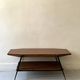 Mid-century coffee table with 2 mahogany wood tops and brass detail, Italy.