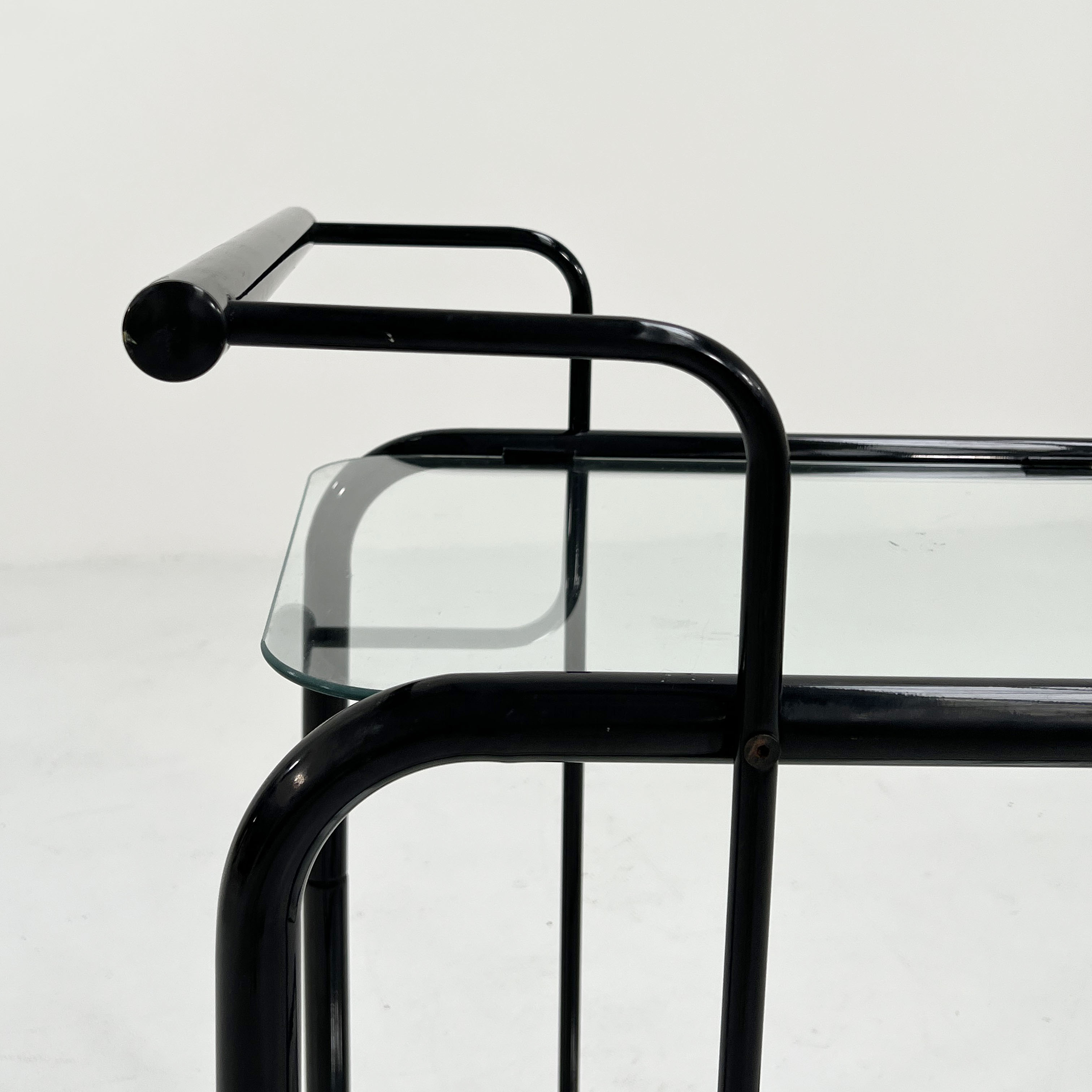 Postmodern service in metal and glass, 1980