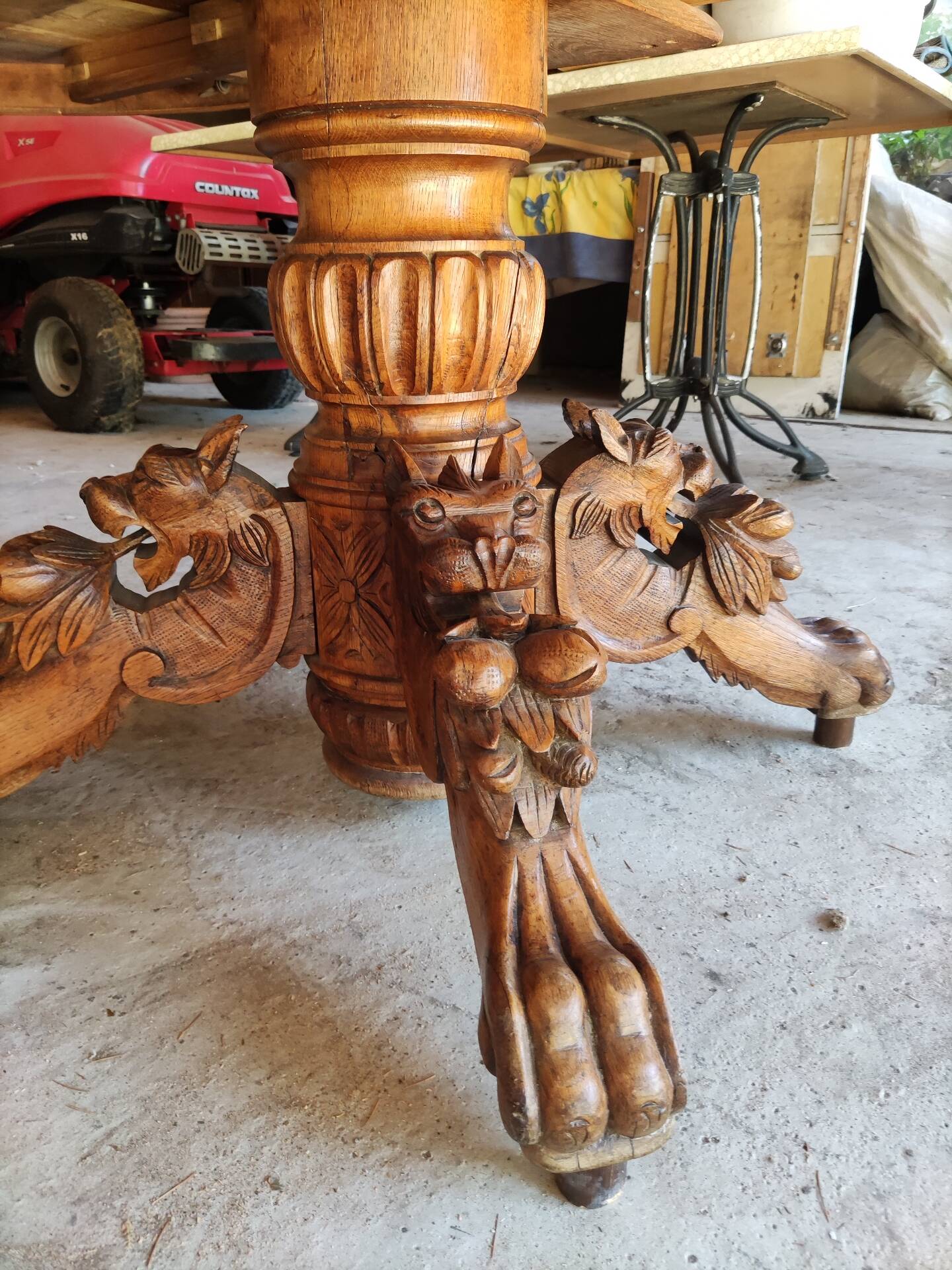 Oval oak table with carved details - known as a hunting table.