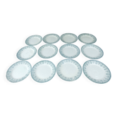 Lot de douze assiettes plates en terre de fer de la faïencerie Moulin des L