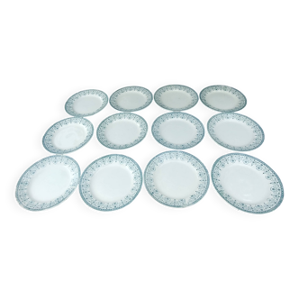Set of twelve flat ironstone plates from the Moulin des L earthenware factory
