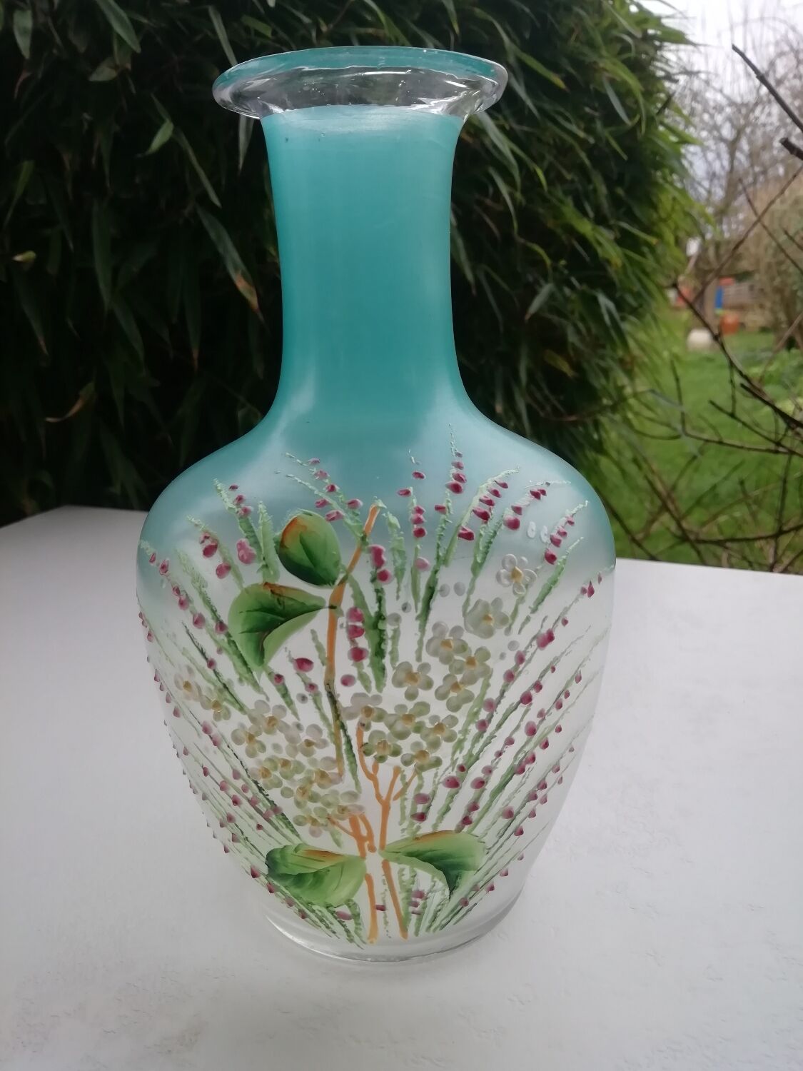 Enameled decorative carafe
