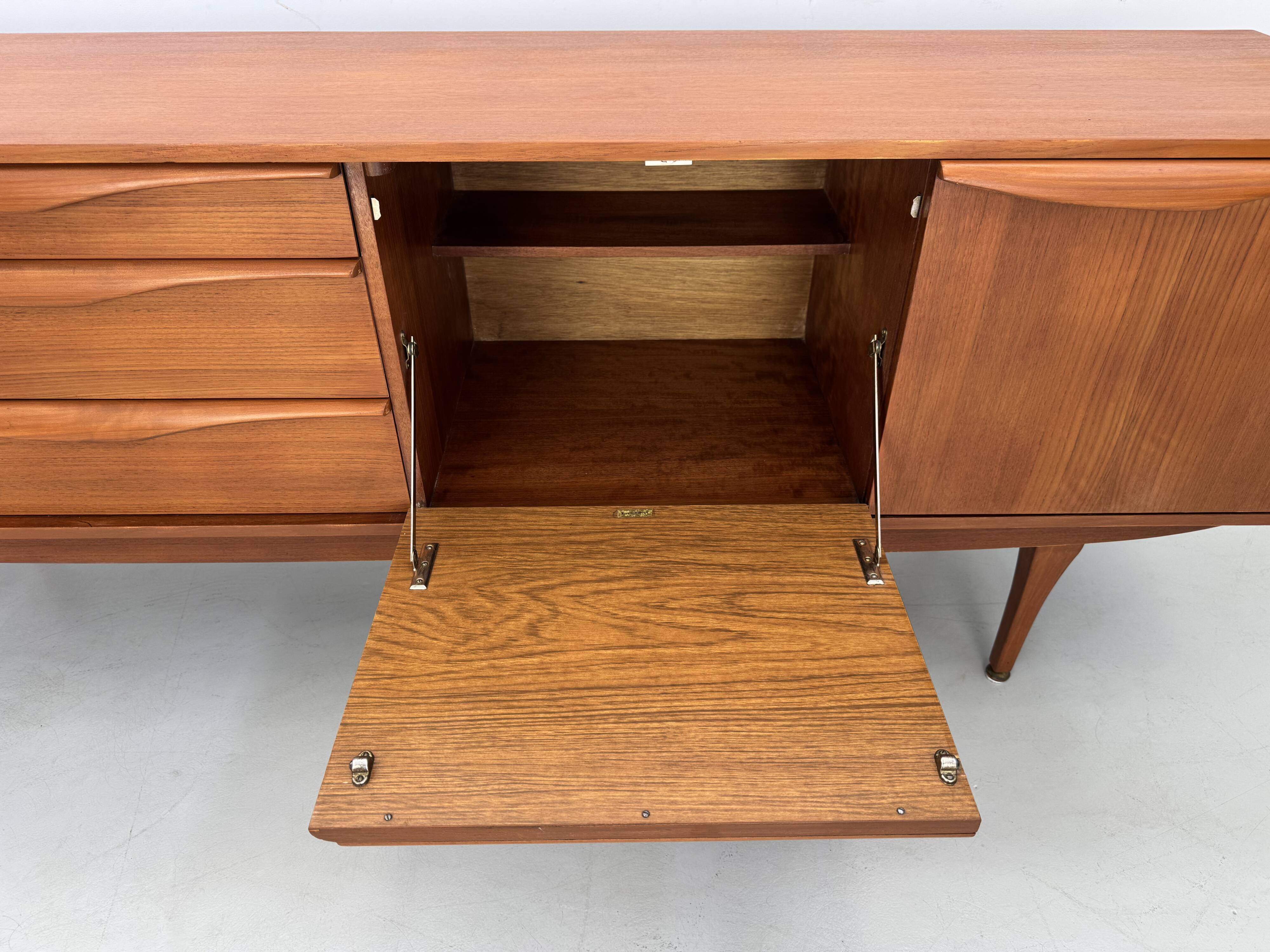 Beautiful and unique Stonehill sideboard from the 1960s made of teak wood.
