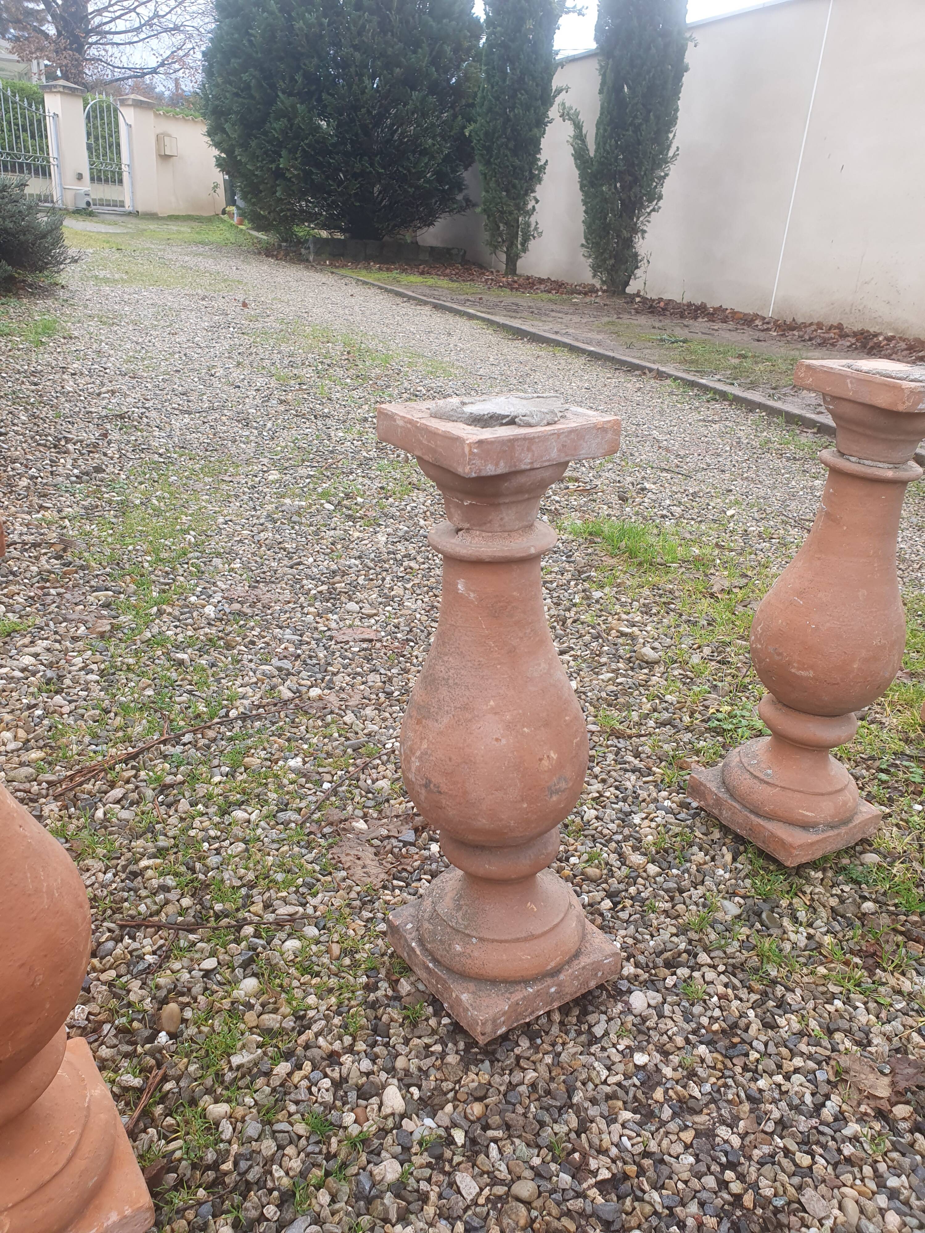 About twenty terracotta balusters from Castelnaudary