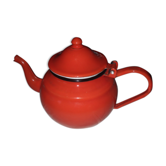 Small red metal teapot