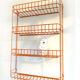 Orange industrial wall shelf