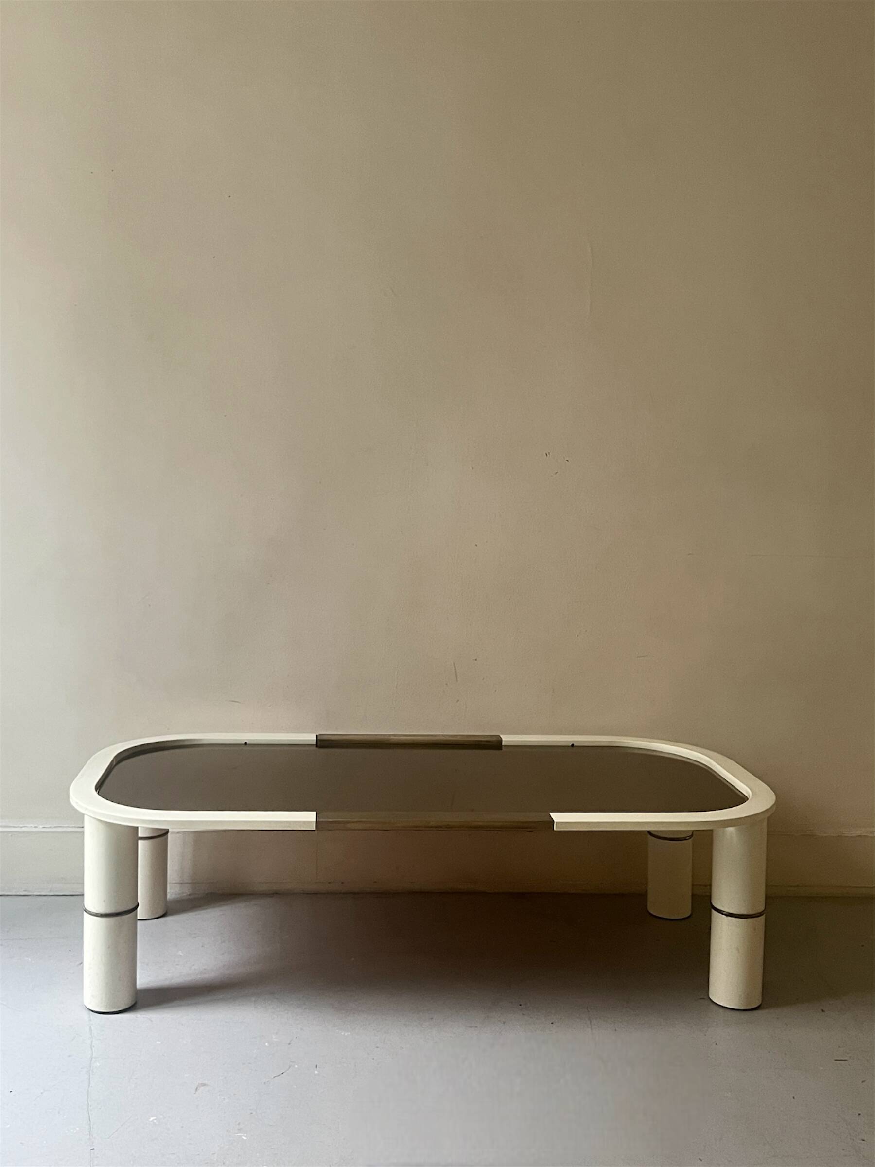 Rectangular coffee table with rounded edges, lacquered metal, brass & smoked mirror, 70s design.