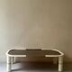 Rectangular coffee table with rounded edges, lacquered metal, brass & smoked mirror, 70s design.