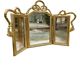Miroir triptyque en bois doré et sculpté