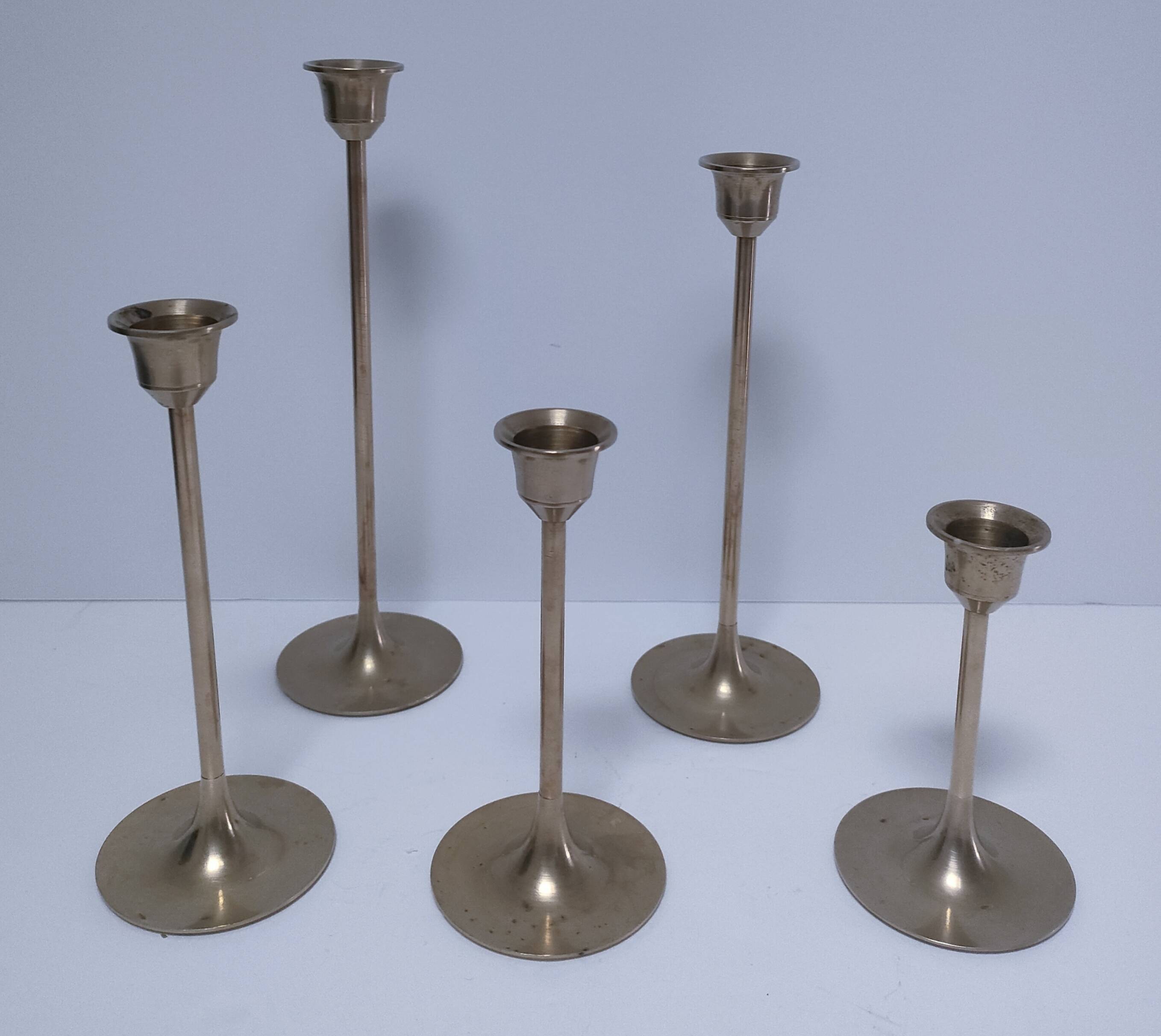 Five vintage Scandinavian design brass candlesticks